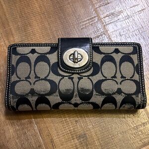 Coach Black and Tan Signature Turnlock Continental Wallet